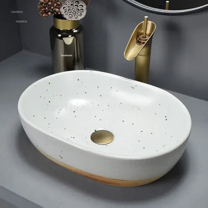 European Ceramic Bathroom Sinks Hotel Homestay Bathroom Washbasin Simple Countertop Home Oval Washbasin Creative Washing Sink X